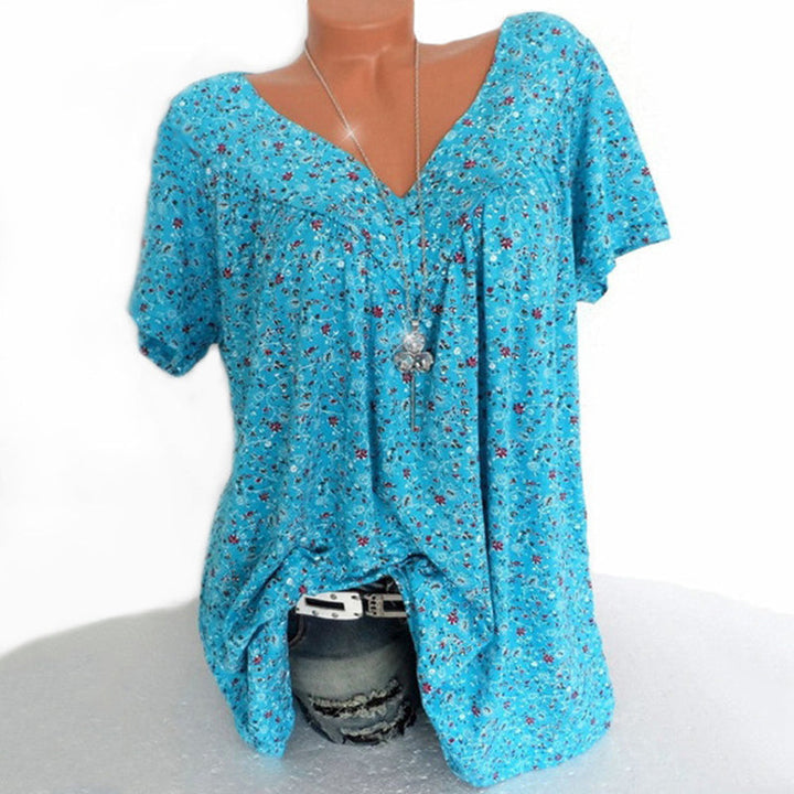 Blaues V-Ausschnitt T-Shirt mit Blumenmuster, kurzärmelig, lässig, Damenmode.