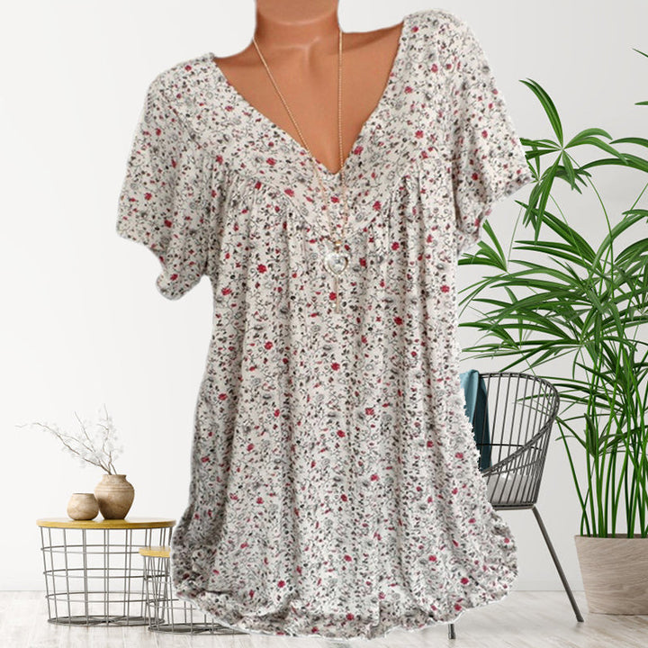 Lockeres, lässiges Kurzarm-T-Shirt mit V-Ausschnitt, Blumenmuster, Damenmode.