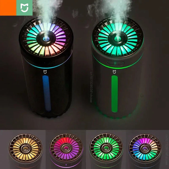 Zwei schwarze Luftbefeuchter mit LED-Beleuchtung, farbwechselnd, modern, stilvoll, für Zuhause.