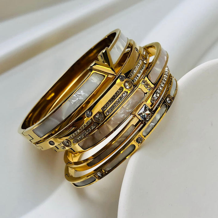 Goldene Edelstahlarmbänder mit Zirkon, luxuriös, wasserdicht, für Damen.