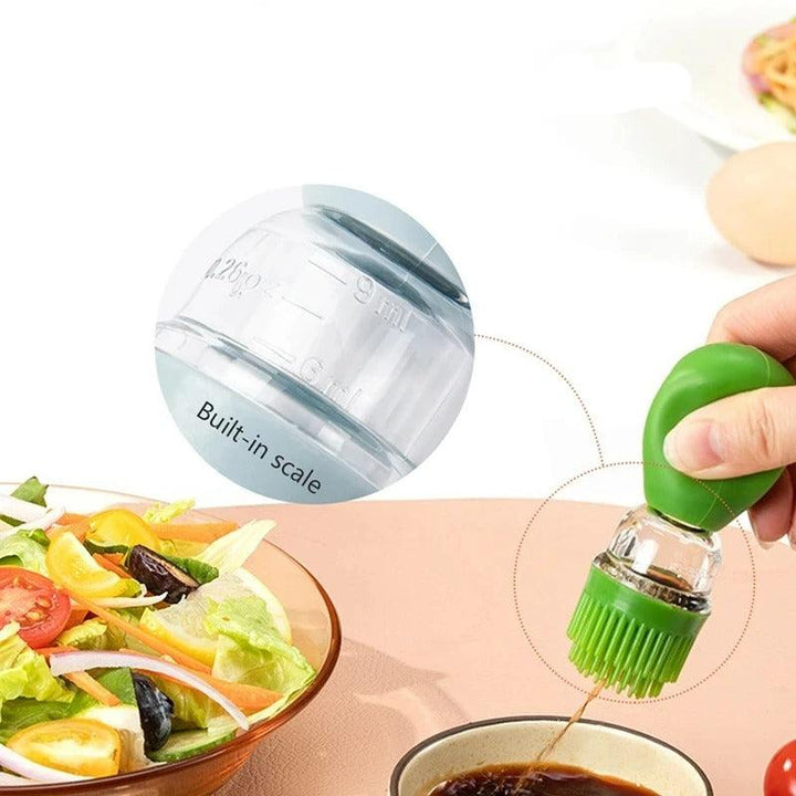 Grüner Silikon-Ölspender mit Pinselaufsatz, ideal für Salate und Grillen.