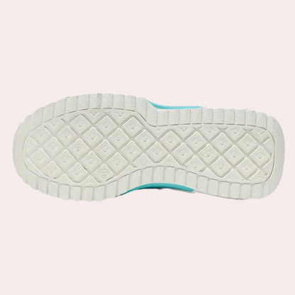 Weiße Sneaker-Sohle mit rutschfestem Profil, Gummi, sportlich, modisch, unisex.