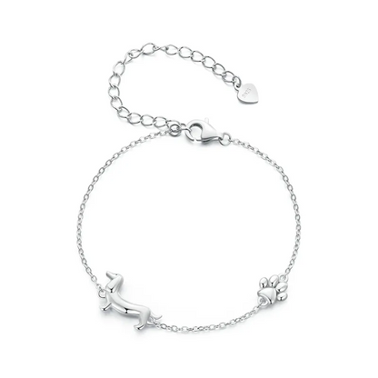 Silberarmband mit Dackelmotiv und Pfotenanhänger, Damen-Schmuck, verstellbar, Geschenkidee.