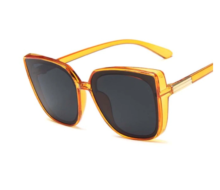 Orange Sonnenbrille mit grauen Gläsern, modisches Accessoire, UV-Schutz, Damenmode.