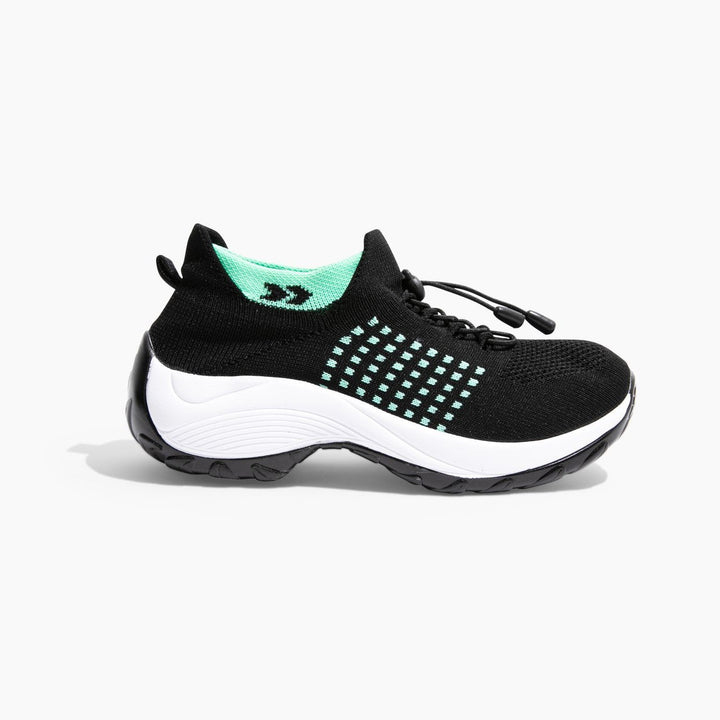 Schwarzer Stretch-Sneaker mit grünen Akzenten, bequeme Orthopädie-Schuhe für Damen.