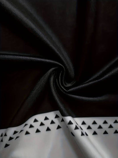 Schwarzer Stoff mit weißen Dreiecksmuster, Polyester, Textildesign, elegant, modern.