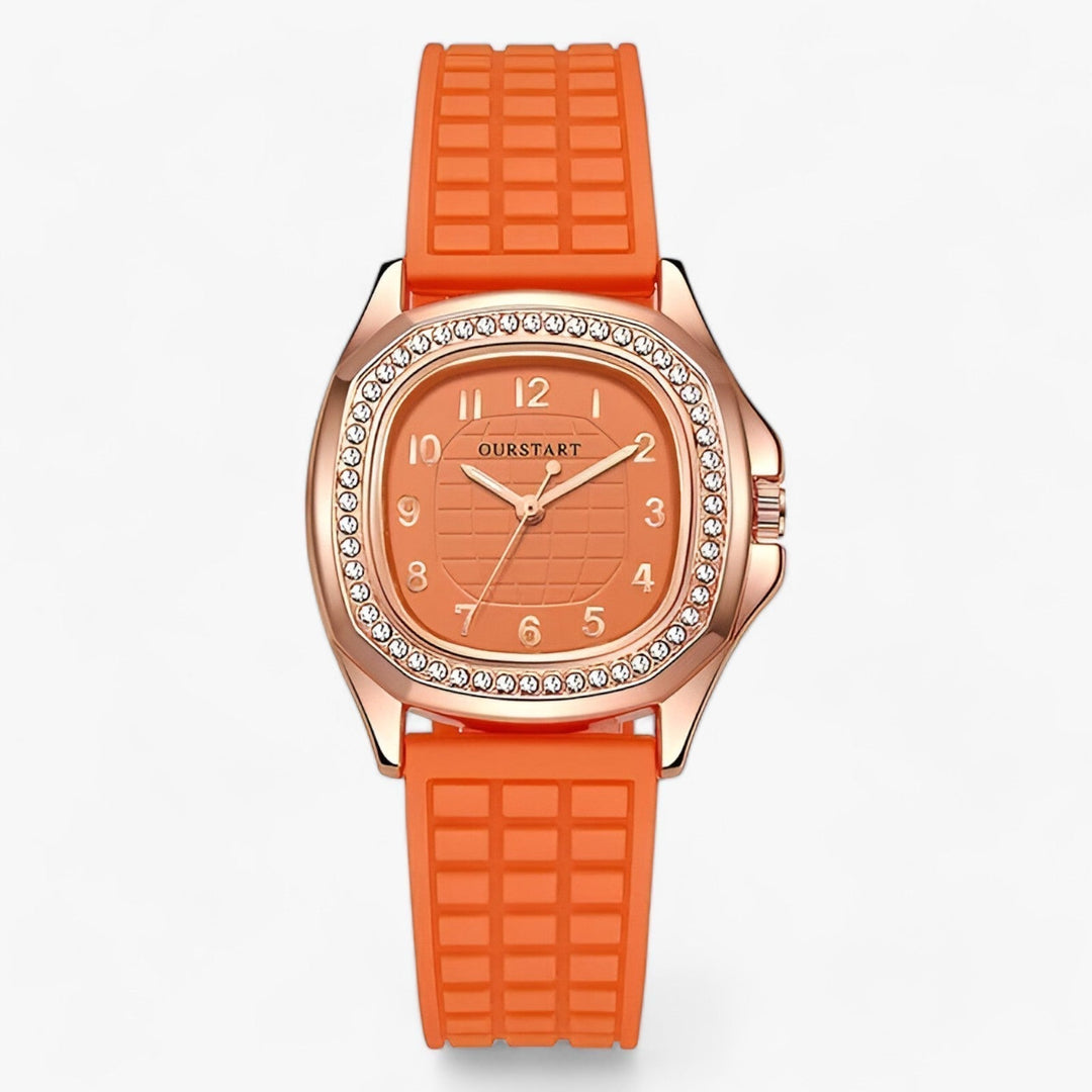 Orange Armbanduhr mit Silikonarmband, roségoldenem Gehäuse und Strasssteinen, modisch.