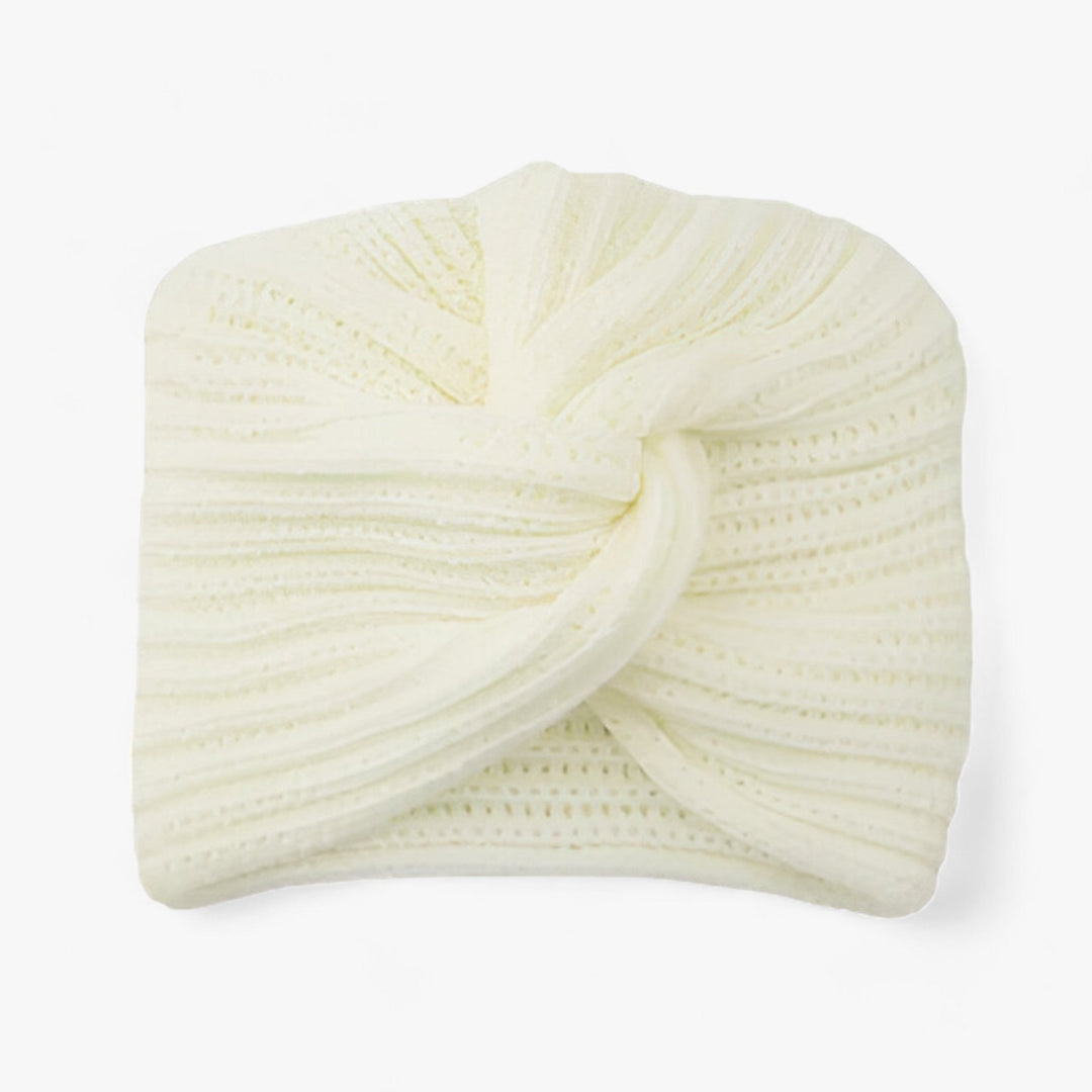 Cremefarbener gestrickter Turban aus Baumwolle, stilvolles Accessoire für Damenmode.