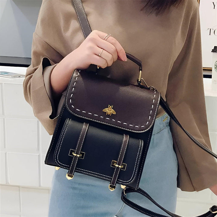 Damenhandtasche aus Leder, schwarz, mit Bienenmotiv, Umhängetasche, modisch, elegant.