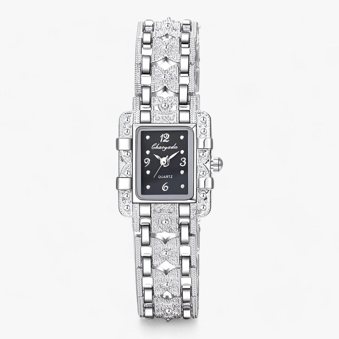 Silberne Damenarmbanduhr mit rechteckigem Zifferblatt, Quarzwerk, elegantes Design.