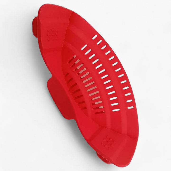 Rotes Kunststoffsieb, ergonomisch, für Küche, Spülbecken, Abtropfen, langlebig, modern.