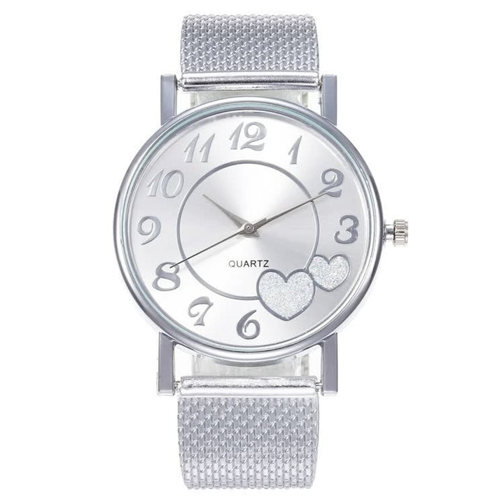 Silberne Damenarmbanduhr mit Herzdesign, Quarzwerk, Metallarmband, modisch, elegant.