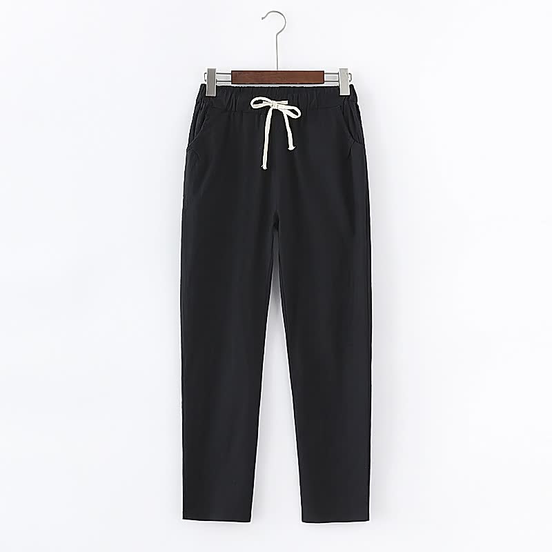 Schwarze Jogginghose mit weißem Kordelzug, bequem, sportlich, Baumwolle, Unisex.