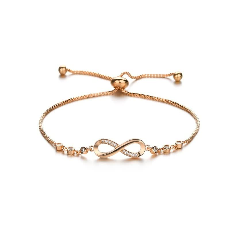 Goldenes Armband mit Unendlichkeitssymbol, verstellbar, mit Zirkonia-Steinen, elegantes Schmuckstück.