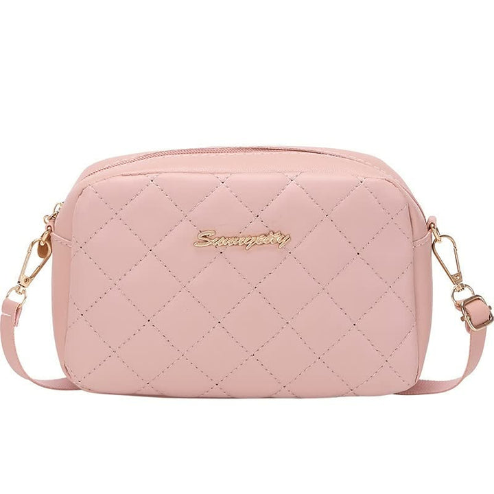 Rosa gesteppte Umhängetasche aus Leder mit goldenen Details, Damenmode Accessoire.