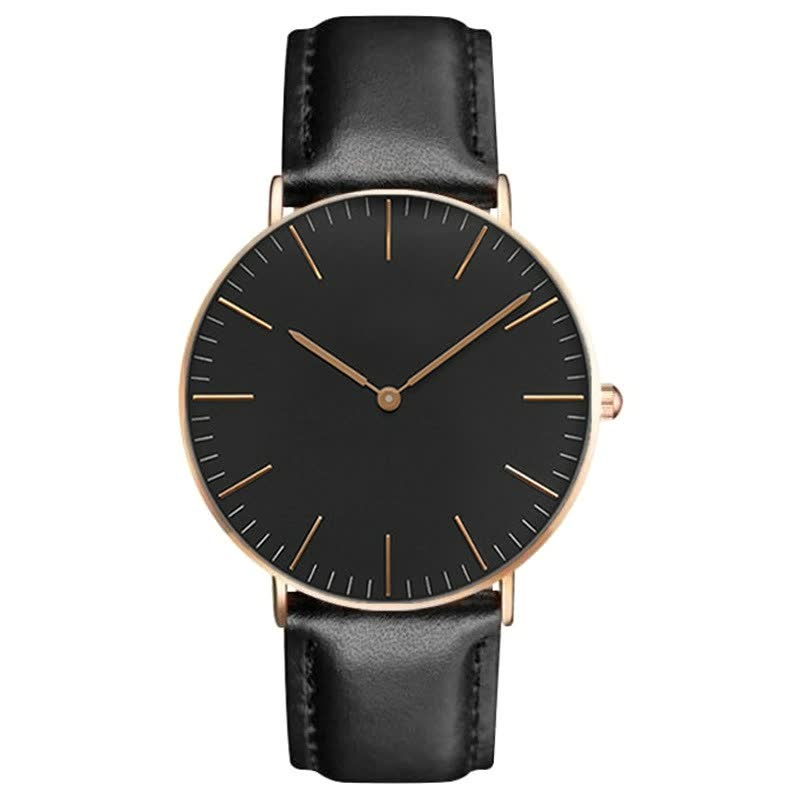 Schwarze Armbanduhr mit Lederarmband, minimalistisches Design, goldene Akzente, Unisex-Uhr.