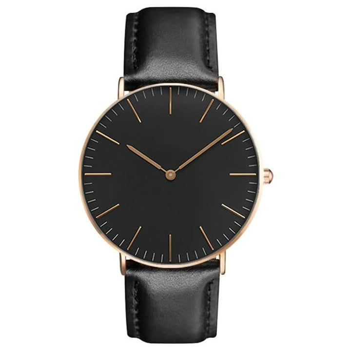 Schwarze Armbanduhr mit Lederarmband, minimalistisches Design, goldene Akzente, Unisex-Uhr.