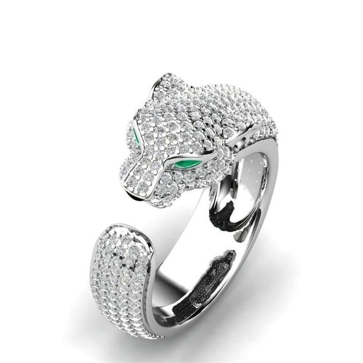 Silberner Panther-Ring mit grünen Augen, besetzt mit Diamanten, luxuriöser Schmuck.