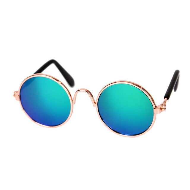 Runde Sonnenbrille, goldener Rahmen, blaue verspiegelte Gläser, modisch, Unisex-Accessoire.