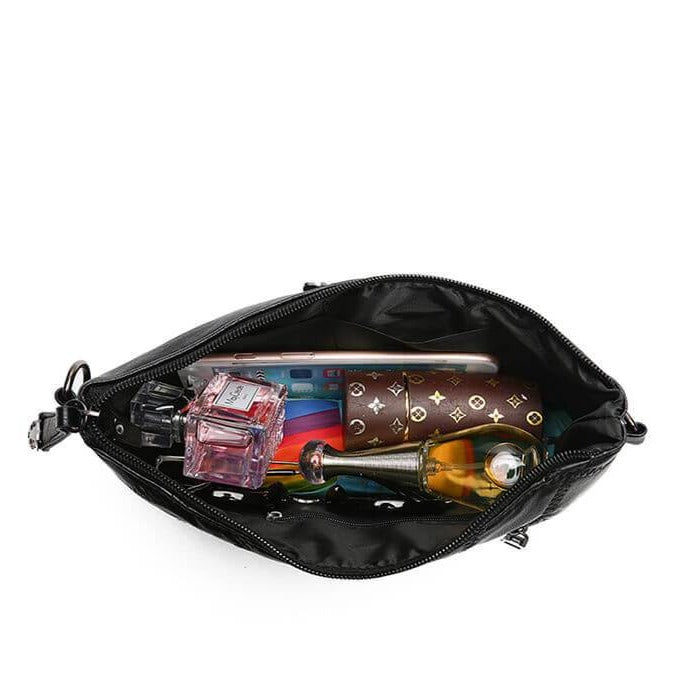 Dámská crossbody kabelka z PU kůže s prostorným vnitřkem.