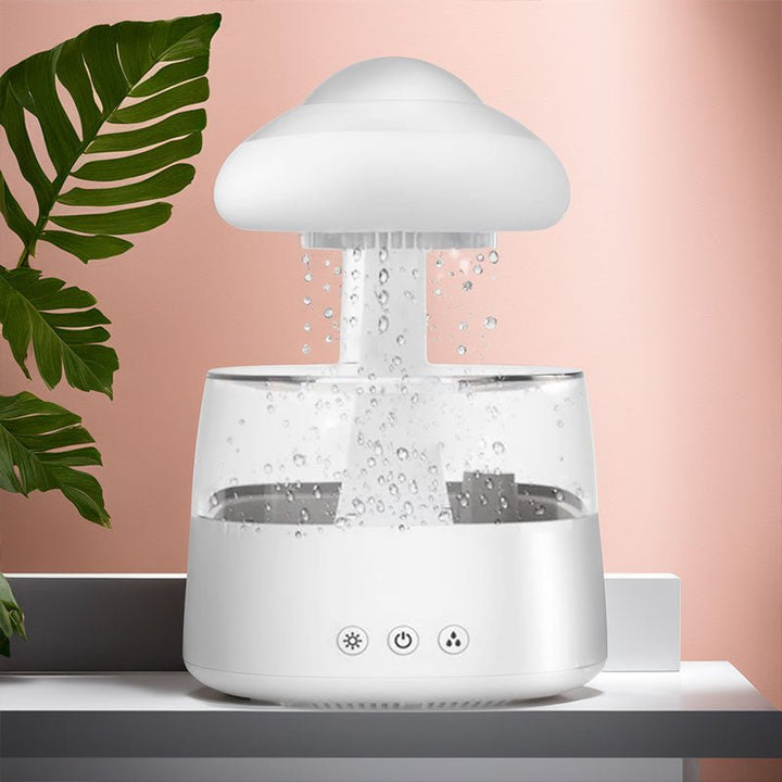 Weißer Wolken-Luftbefeuchter, modernes Design, transparent, für Raumklima, auf Tisch.