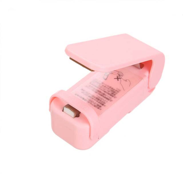 Rosa Mini-Handversiegelungsgerät für Plastikbeutel, tragbar, Kunststoff, Küche.