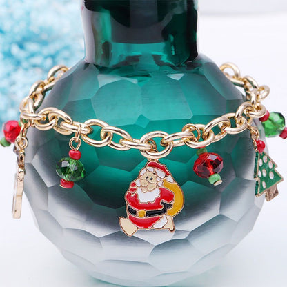 Weihnachtsarmband mit Santa-Anhänger, goldene Kette, bunte Perlen, festlicher Schmuck.