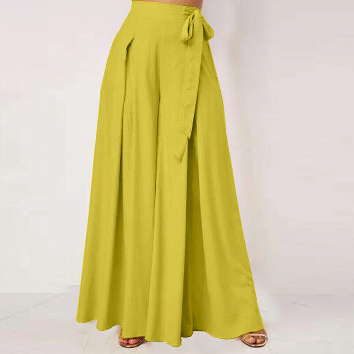 Gelbe Damenhose, weites Bein, hoher Bund, Sommermode, eleganter Stil, Bindegürtel.