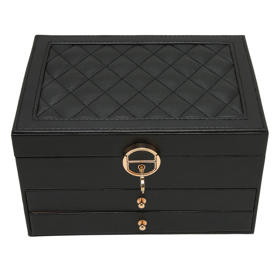 Schwarze Schmuckschatulle aus Leder mit Rautenmuster, abschließbar, zwei Schubladen.