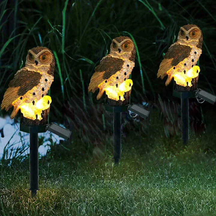 Drei Eulen-Solarleuchten im Garten, leuchtend, wetterfest, dekorativ, energiesparend.