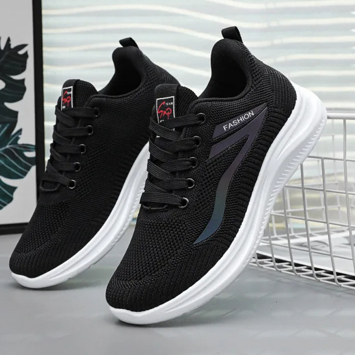 Schwarze Sportschuhe mit weicher Sohle, atmungsaktiv, modisches Design, Herren Sneaker.