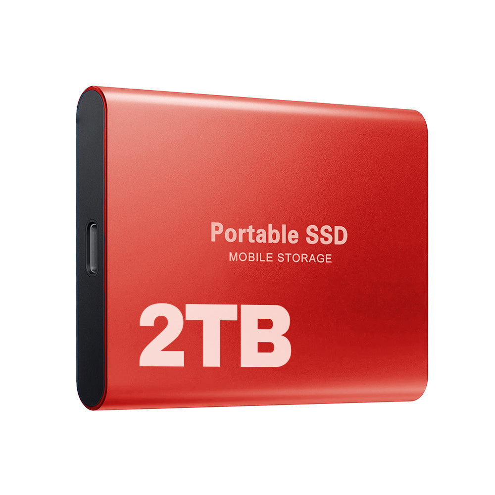 Červený kovový externí disk s kapacitou 2 TB, zobrazený šikmo z boku s konektorem USB-C na užší straně. 8