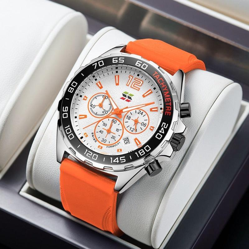 Orange Armbanduhr mit Edelstahlgehäuse, Tachymeter-Lünette und Chronographen-Zifferblatt.