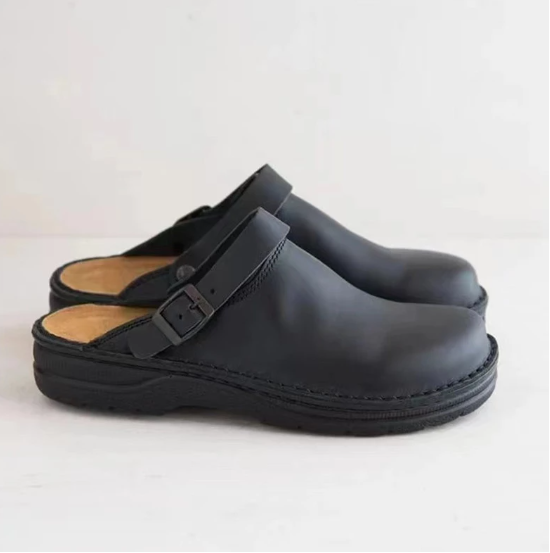 Schwarze Leder-Clogs mit verstellbarem Riemen, bequeme Schuhe für Damen und Herren.