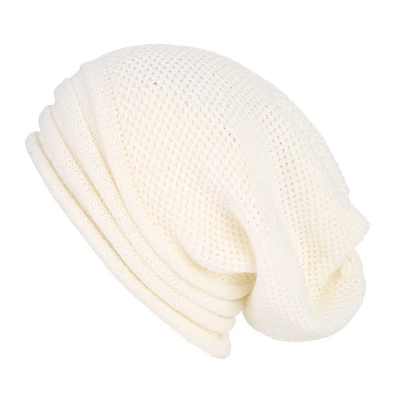 Weiße Strickmütze aus Baumwolle, lässiger Stil, atmungsaktiv, modisches Accessoire.