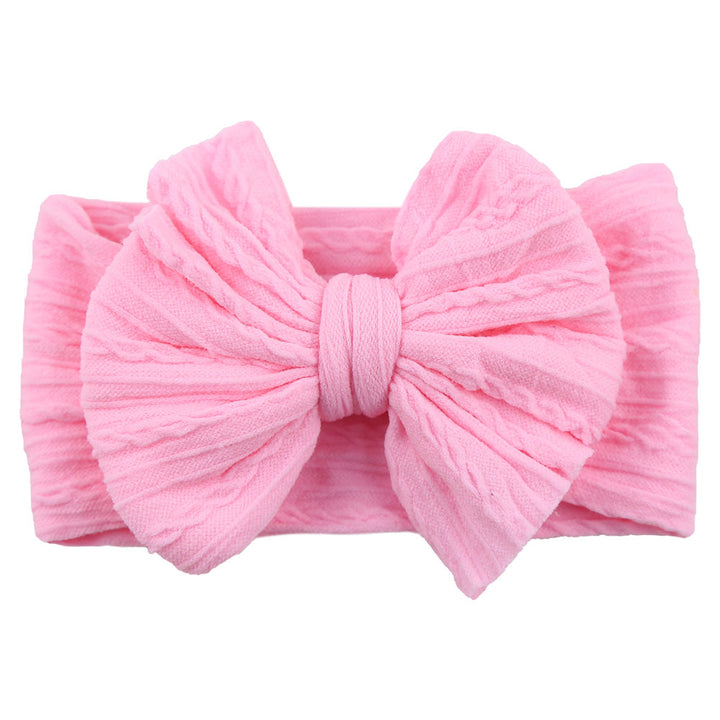 Rosa Baby-Stirnband mit großer Schleife, weiches Baumwollmaterial, modisches Accessoire.
